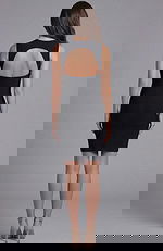 Fitted dress with asymmetric neckline and floral shoulder accent