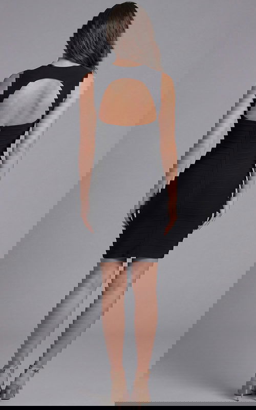 Fitted dress with asymmetric neckline and floral shoulder accent