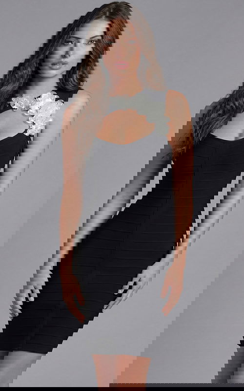 Knee length fitted dress with open back and smooth structured finish