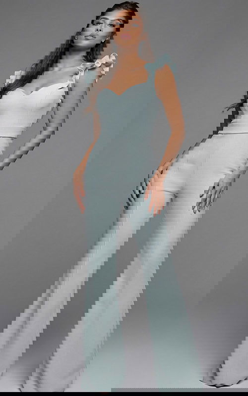 Fitted sleeveless jumpsuit with ruffled shoulder straps and wide leg silhouette