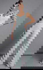 Sleeveless fitted jumpsuit with ruffled shoulder straps and wide leg design