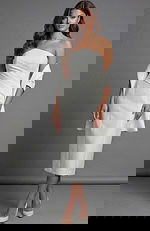 strapless white dress with center slit and smooth finish