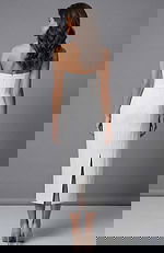 Strapless white evening dress with fitted silhouette and wrap bodice