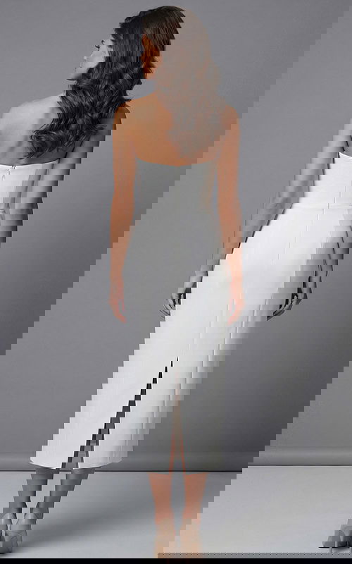 Strapless white evening dress with fitted silhouette and wrap bodice