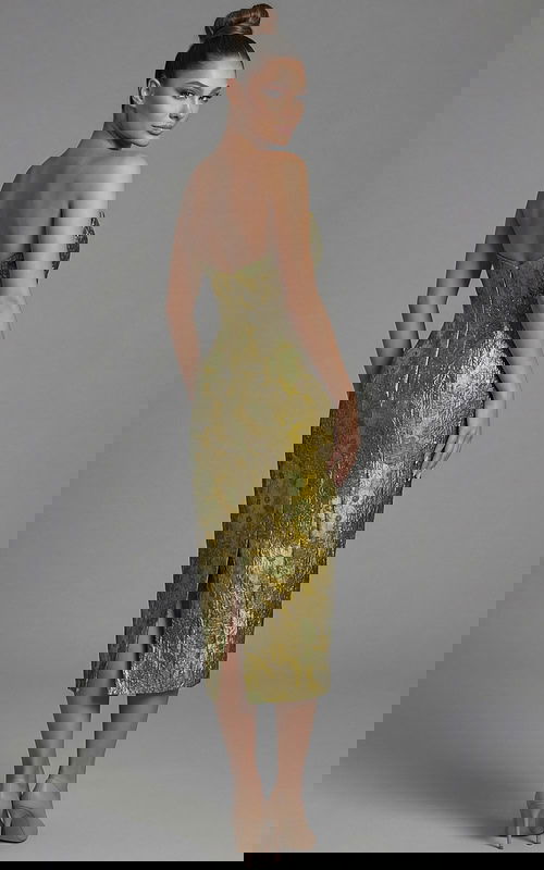 Fitted metallic brocade evening dress with structured bodice and shawl