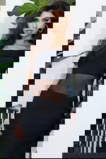 Jovani 51666 black off the shoulder fitted bandage gown with sheer mesh midriff cutout and floor length column silhouette