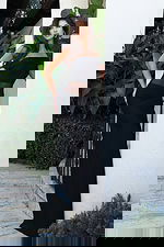 Jovani 51666 black off the shoulder fitted bandage gown with sheer mesh midriff cutout and floor length column silhouette