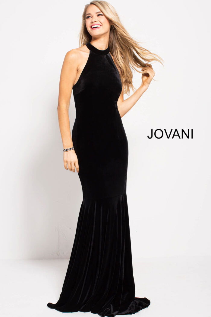 model wearing Jovani 51680 black velvet mermaid gown full length