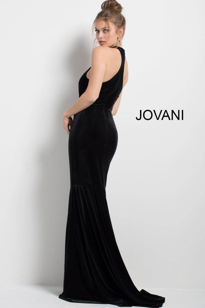 model wearing Jovani 51680 black velvet mermaid gown back view