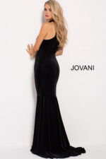 model showing back of Jovani 51680 black velvet mermaid gown