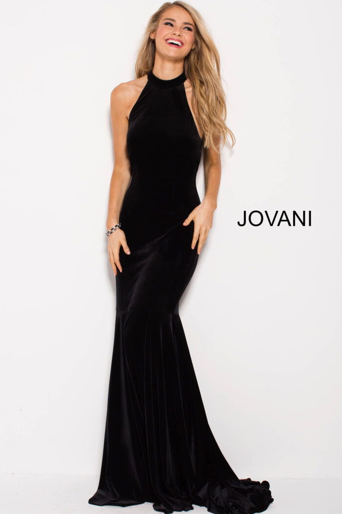 model wearing Jovani 51680 black velvet mermaid gown front view