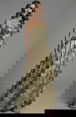 Strapless jacquard gown with structured bodice and floral waist detail