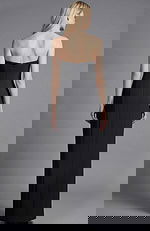 Strapless fitted evening gown with smooth back and floor length straight silhouette