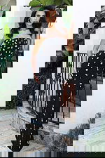 Jovani 51807 black strapless fitted column gown with scattered silver crystal floral and bow embellishments throughout and sheer illusion neckline