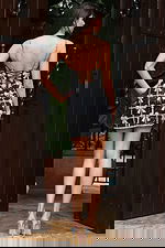 back of Black embellished bow mini dress with lace up back