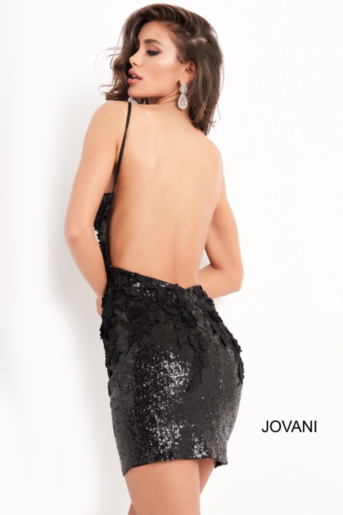 Model wearing Jovani 05282 black back view showcasing open back design.