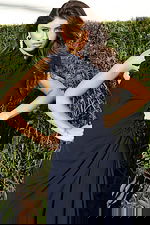 Navy high neck floral appliqué draped gown