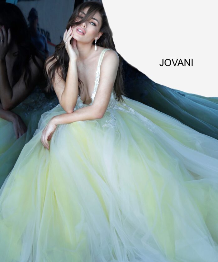 model wearing Jovani 55634 gown with yellow accents and lace applique