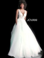 model wearing Jovani 55634 white gown with deep V-neckline