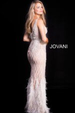 Back view of model wearing Jovani 55796 ivory gown with intricate beading.