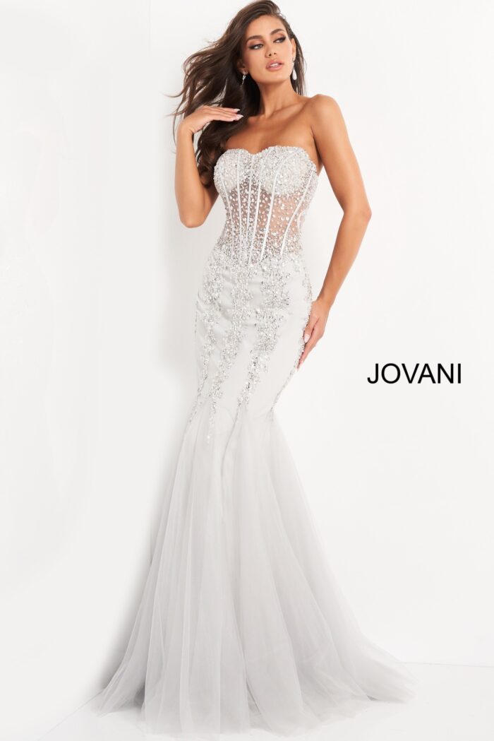 Model wearing Jovani 5908 silver gown with detailed embellishments, front view.