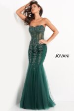 Model wearing Jovani 5908 green dress with mermaid silhouette.