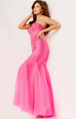 Model wearing Jovani 5908 pink mermaid gown highlighting sweetheart neckline.
