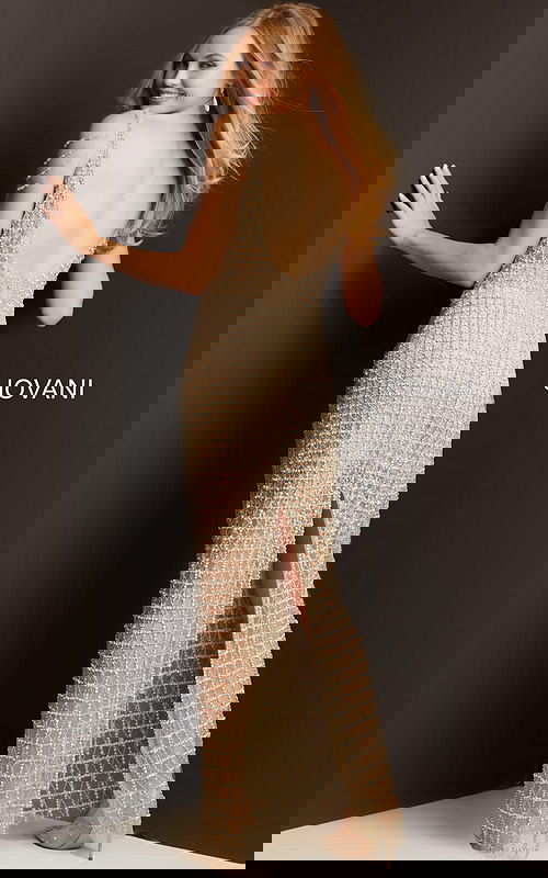 Model wearing Jovani 05997 nude dress with embellished pattern, back view.