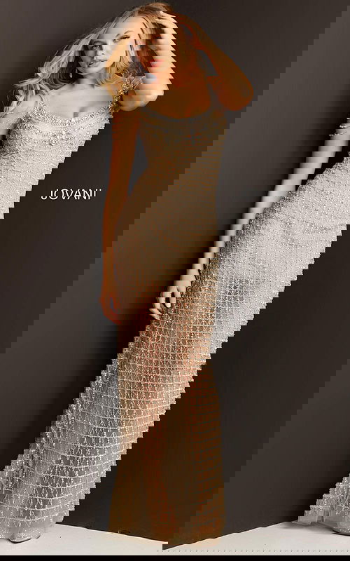 Model wearing Jovani 05997 nude dress with embellished pattern, front view.