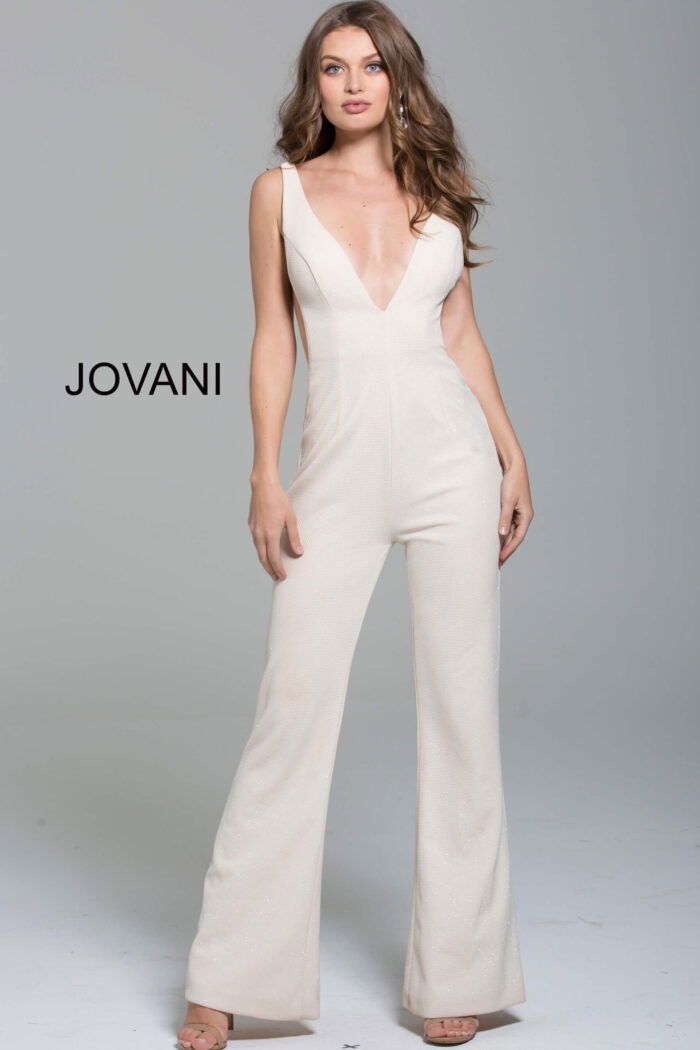 model wearing Jovani 60017 in ivory with a deep V-neckline and wide straps