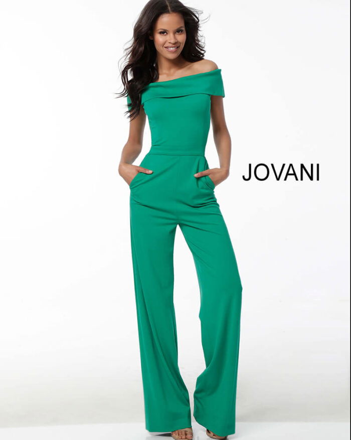 Model showcasing Jovani 60103 green jumpsuit highlighting its elegant fit and design.