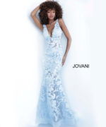 Model wearing Jovani 60283 in light blue, back view highlighting lace.