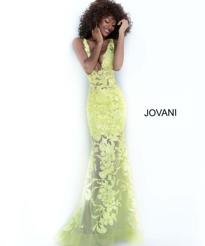 Model wearing Jovani 60283 in yellow, front view of glamorous gown.