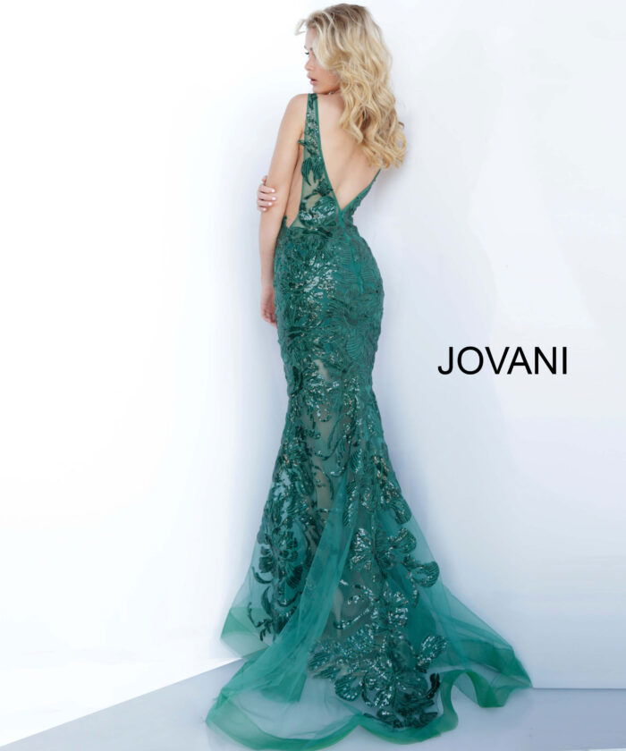 Model wearing Jovani 60283 in green, back view of lace dress.