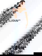 Model wearing Jovani 61380 black dress showing off the back design with floral embroidery.