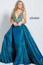 Model showcasing Jovani 61464 blue dress with an A-line silhouette and beaded details, front view.
