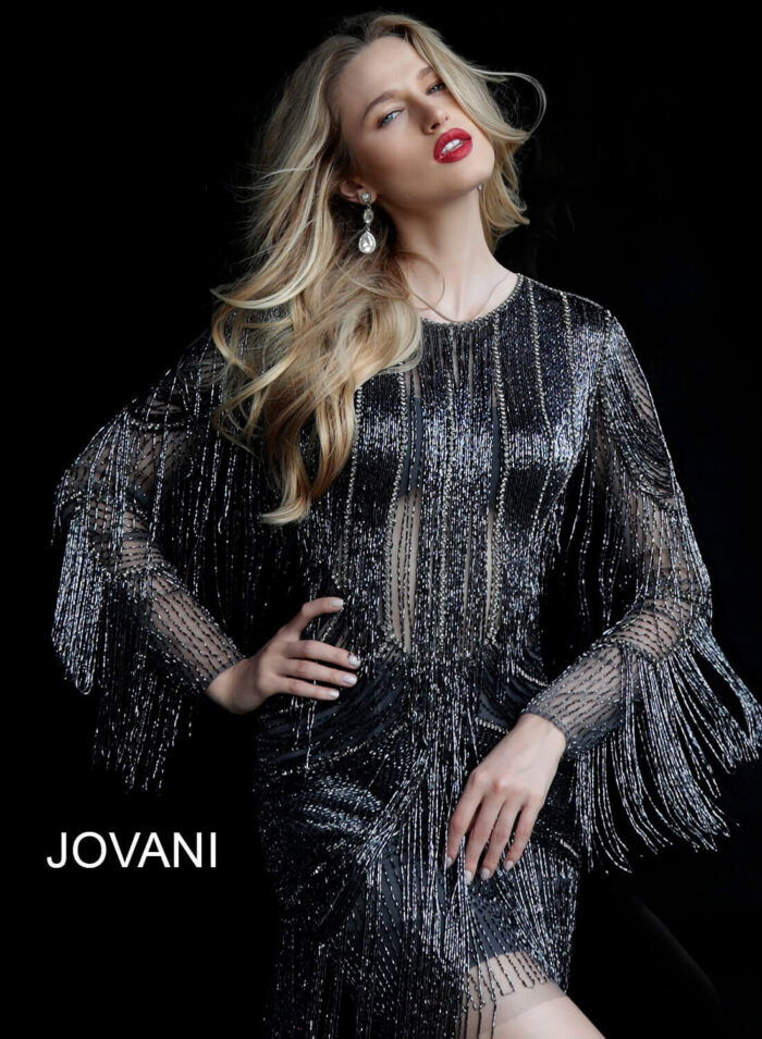 Model wearing Jovani 61636 gray dress, frontal view highlighting beaded design.
