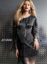 Model wearing Jovani 61636 dress, front showcasing fringe and bead details.