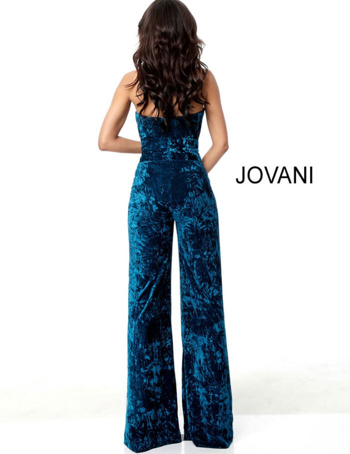 Back view of Jovani 61740 teal blue velvet jumpsuit, highlighting the wide-leg silhouette.