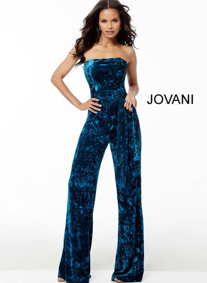 Model wearing Jovani 61740 teal blue jumpsuit, showing off the elegant design with wide-leg pants.