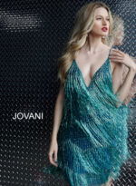 Model wearing Jovani 61883 Teal Fringe Spaghetti Strap Cocktail Dress