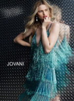 Model wearing Jovani 61883 Teal Fringe Spaghetti Strap Cocktail Dress