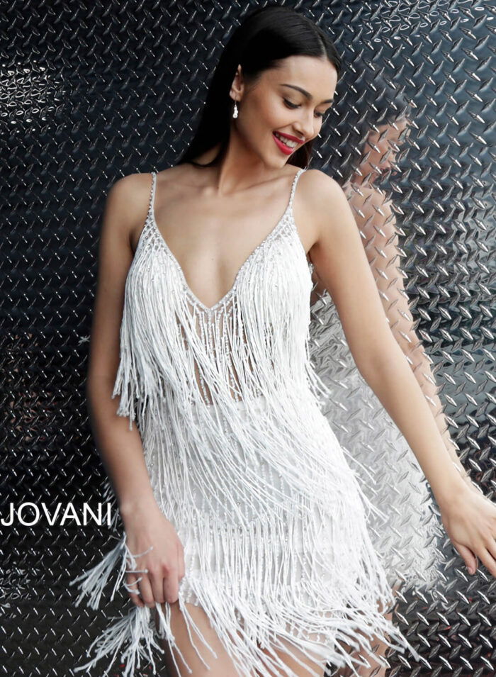 Model wearing Jovani 61883 Teal Fringe Spaghetti Strap Cocktail Dress