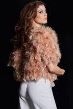 Model in Jovani 62104 nude dress, back view highlighting feather details.