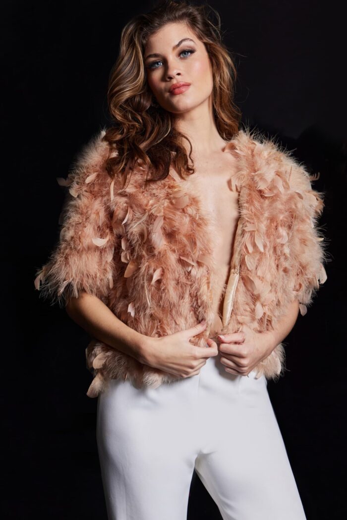 Front view of model wearing Jovani 62104 nude dress with feathered accents.