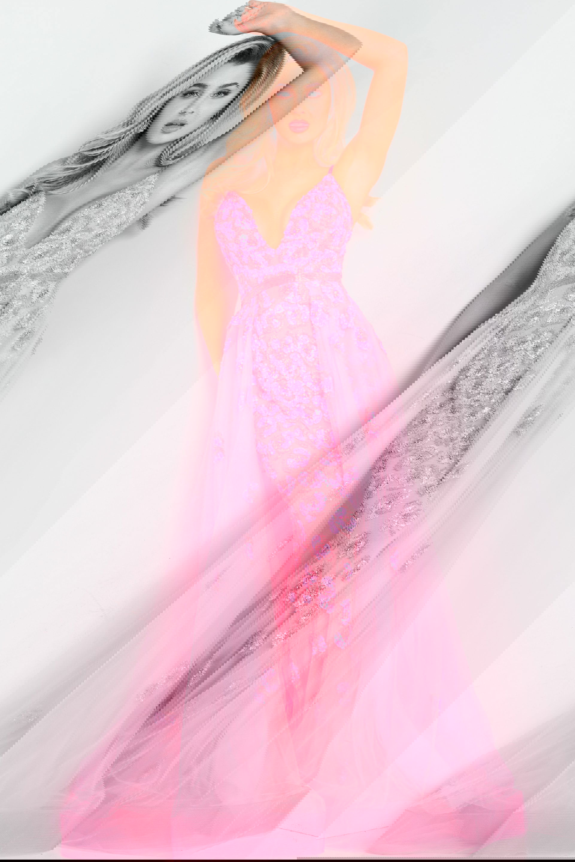 62929_4.jpg Model wearing Jovani 62929, a pink gown with floral appliqués and a tulle overlay.