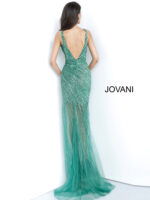Model wearing Jovani 63405 emerald sequin dress with plunging back