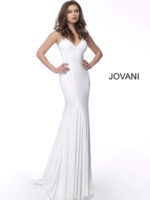 Model wearing Jovani 63563 white gown with beautiful embellishments