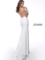 Model showcasing the back of Jovani 63563 white gown with elegant low back