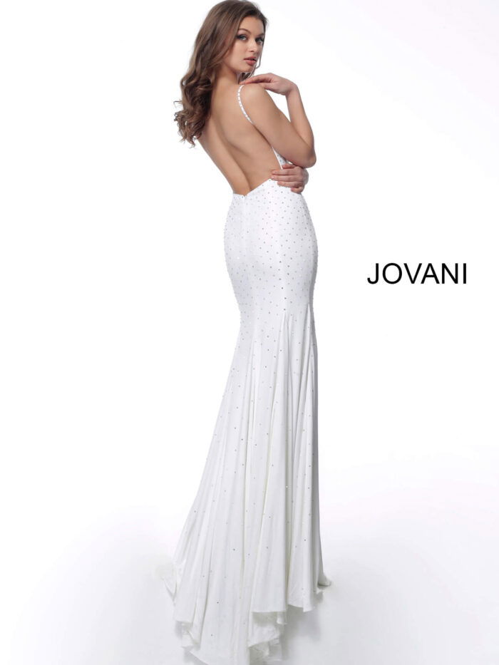Model showcasing the back of Jovani 63563 white gown with elegant low back